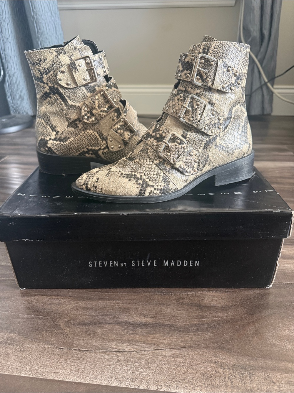 STEVEN by Steve Madden Beige and Black Snake-Print Triple Buckle Ankle Boots